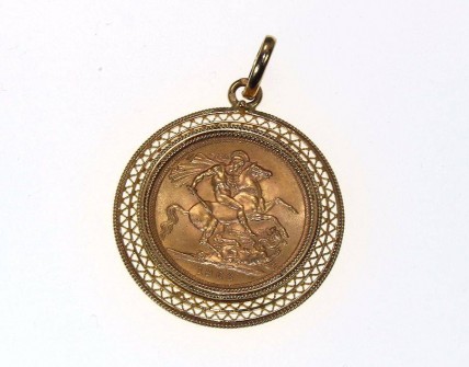 Medalha com Libra em Ouro (916)